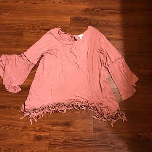 Light weight shirt that’s a light pink.